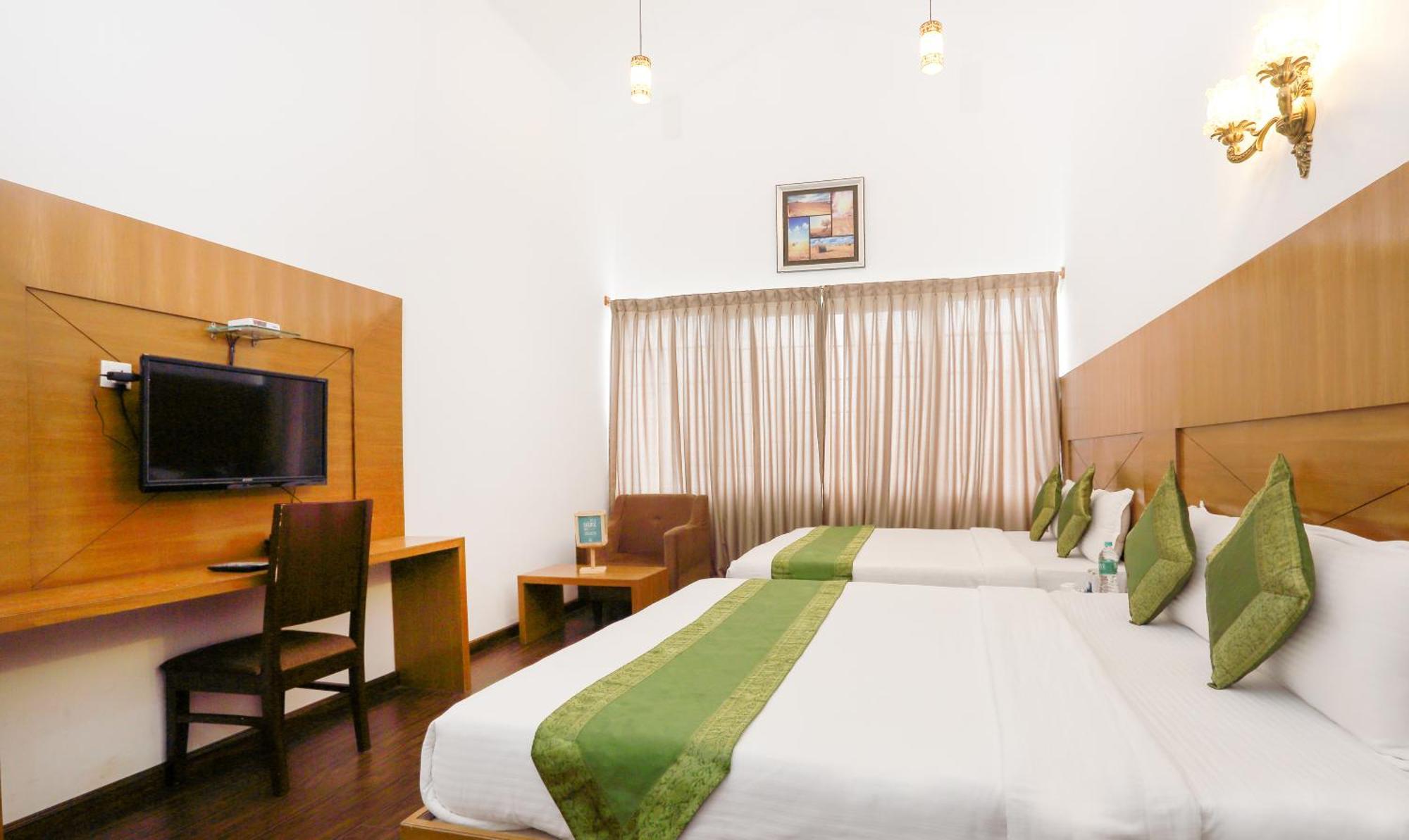 אוטי Treebo Skydale Inn & Suites With Mountain View מראה חיצוני תמונה