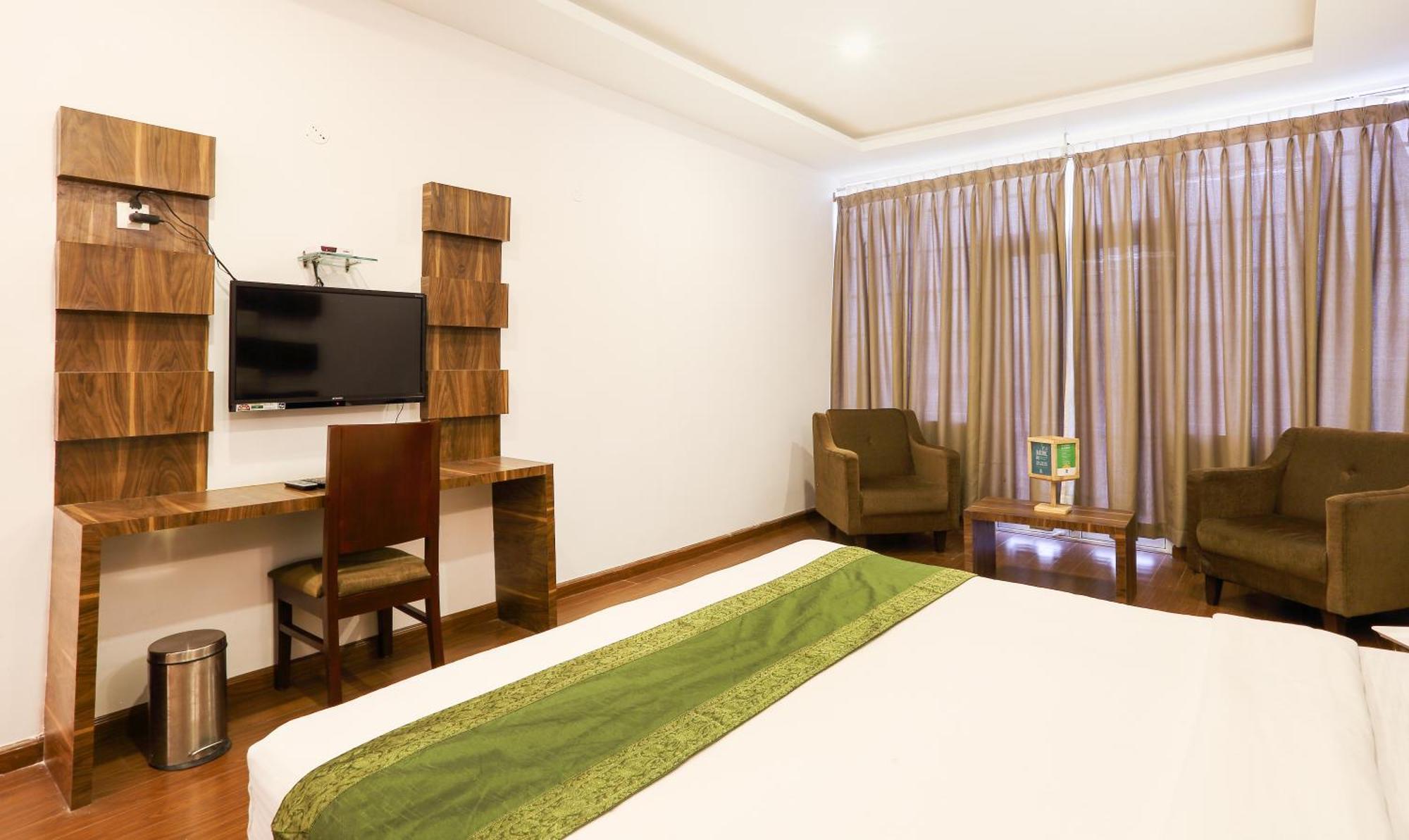 אוטי Treebo Skydale Inn & Suites With Mountain View מראה חיצוני תמונה